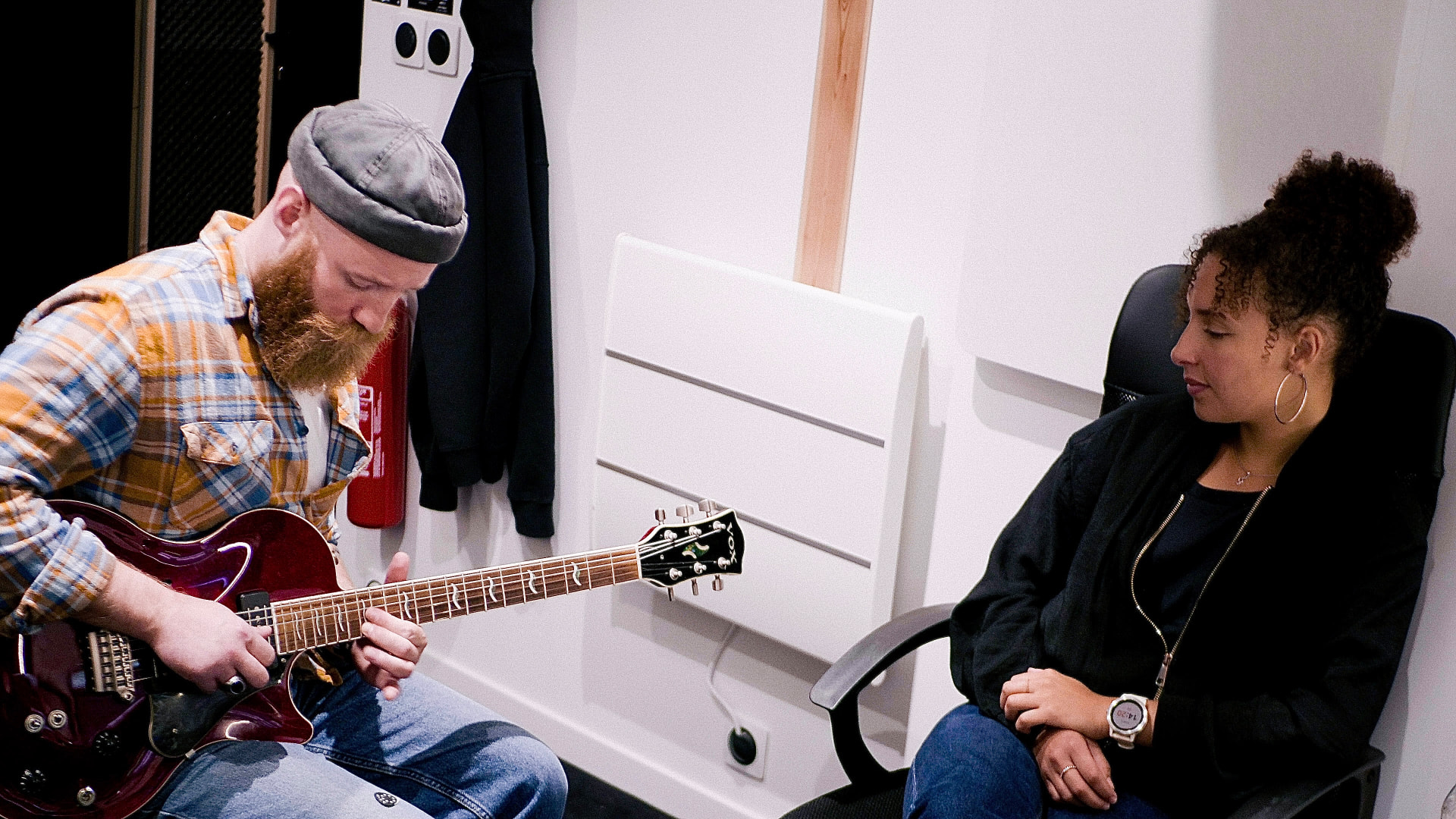 Noeme in the studio with her guitarist